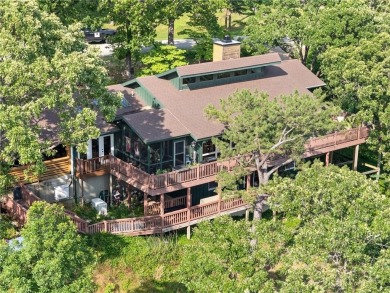 Welcome to luxury! Nestled on nearly an acre across two prime on Holiday Island Golf Course in Arkansas - for sale on GolfHomes.com, golf home, golf lot