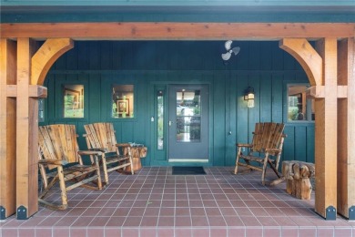 Welcome to luxury! Nestled on nearly an acre across two prime on Holiday Island Golf Course in Arkansas - for sale on GolfHomes.com, golf home, golf lot