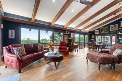 Welcome to luxury! Nestled on nearly an acre across two prime on Holiday Island Golf Course in Arkansas - for sale on GolfHomes.com, golf home, golf lot
