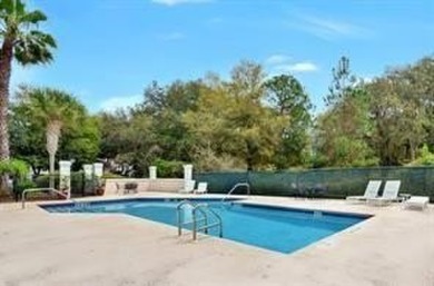 This charming 2-bedroom, 2-bath townhome villa is nestled in the on Golf Club of Amelia Island in Florida - for sale on GolfHomes.com, golf home, golf lot