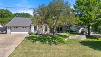 Welcome to a beautifully maintained stone home nestled in a on De Cordova Bend Country Club in Texas - for sale on GolfHomes.com, golf home, golf lot