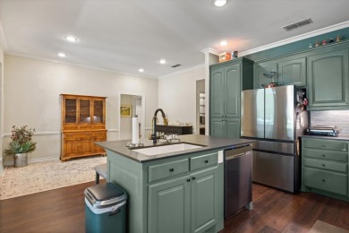 Welcome to a beautifully maintained stone home nestled in a on De Cordova Bend Country Club in Texas - for sale on GolfHomes.com, golf home, golf lot