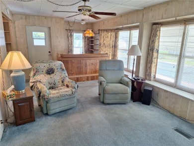 Under contract-accepting backup offers. PRICE REDUCED! This on Tarpon Springs Golf Course in Florida - for sale on GolfHomes.com, golf home, golf lot