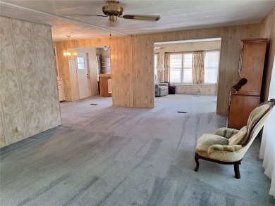 Under contract-accepting backup offers. PRICE REDUCED! This on Tarpon Springs Golf Course in Florida - for sale on GolfHomes.com, golf home, golf lot