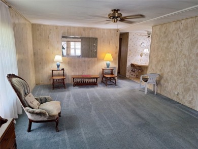 Under contract-accepting backup offers. PRICE REDUCED! This on Tarpon Springs Golf Course in Florida - for sale on GolfHomes.com, golf home, golf lot
