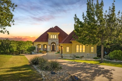 Tuscan design and accents describe this custom home backing up on White Bluff Resort - Old Course in Texas - for sale on GolfHomes.com, golf home, golf lot