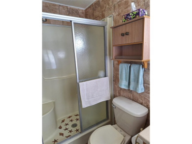 Under contract-accepting backup offers. PRICE REDUCED! This on Tarpon Springs Golf Course in Florida - for sale on GolfHomes.com, golf home, golf lot