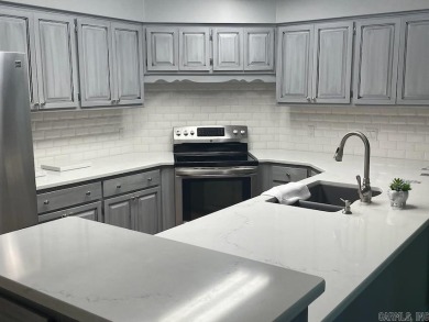Unique townhome in Villa Alegre neighborhood.  Enjoy the comfort on DeSoto Golf Course in Arkansas - for sale on GolfHomes.com, golf home, golf lot
