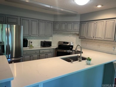 Unique townhome in Villa Alegre neighborhood.  Enjoy the comfort on DeSoto Golf Course in Arkansas - for sale on GolfHomes.com, golf home, golf lot