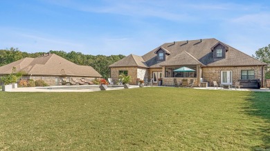 Experience luxury living in this custom-built 5 bedroom,(3br on Sage Meadows Golf Course in Arkansas - for sale on GolfHomes.com, golf home, golf lot