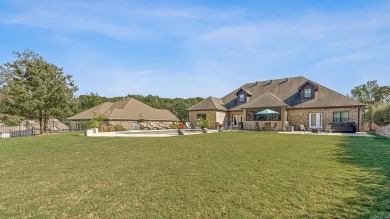 Experience luxury living in this custom-built 5 bedroom,(3br on Sage Meadows Golf Course in Arkansas - for sale on GolfHomes.com, golf home, golf lot