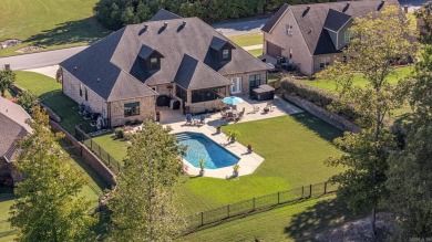 Experience luxury living in this custom-built 5 bedroom,(3br on Sage Meadows Golf Course in Arkansas - for sale on GolfHomes.com, golf home, golf lot