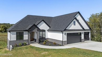 Situated in the highly desirable Kahite neighborhood, known for on Tellico Village -The Links At Kahite Golf Course in Tennessee - for sale on GolfHomes.com, golf home, golf lot