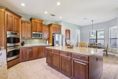 Impressive executive home with thoughtful floor plan, high-end on Eagle Harbor Golf Club in Florida - for sale on GolfHomes.com, golf home, golf lot