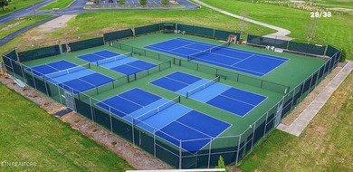 Situated in the highly desirable Kahite neighborhood, known for on Tellico Village -The Links At Kahite Golf Course in Tennessee - for sale on GolfHomes.com, golf home, golf lot