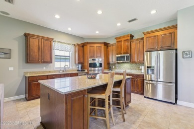 Impressive executive home with thoughtful floor plan, high-end on Eagle Harbor Golf Club in Florida - for sale on GolfHomes.com, golf home, golf lot