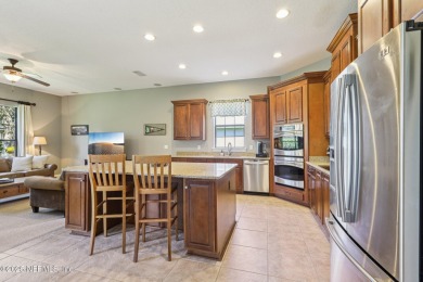 Impressive executive home with thoughtful floor plan, high-end on Eagle Harbor Golf Club in Florida - for sale on GolfHomes.com, golf home, golf lot