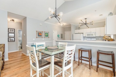 This exquisite top floor end unit is a luxurious retreat with on Barefoot Resort and Golf Club  in South Carolina - for sale on GolfHomes.com, golf home, golf lot