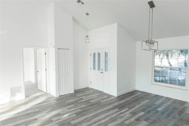 Stunning Newly Renovated Pool Home with RV Garage w/Full Hookups on Silverado Golf and Country Club in Florida - for sale on GolfHomes.com, golf home, golf lot