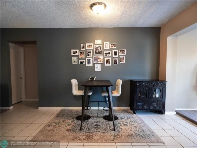 Discover the charm of this inviting single-family home. Located on Crystal Lake Country Club in Florida - for sale on GolfHomes.com, golf home, golf lot