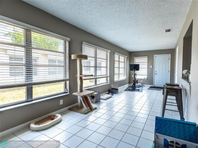 Discover the charm of this inviting single-family home. Located on Crystal Lake Country Club in Florida - for sale on GolfHomes.com, golf home, golf lot