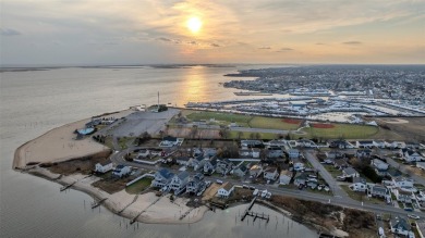 Stunning 3-bedroom, 2-bath Cape located in a prime location at on Bergen Point Golf Course in New York - for sale on GolfHomes.com, golf home, golf lot