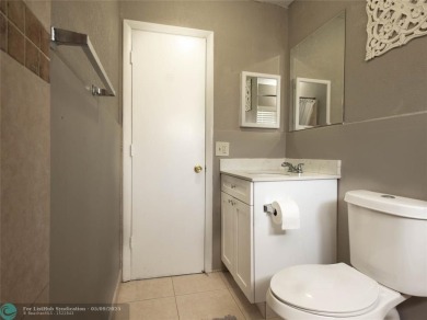 Discover the charm of this inviting single-family home. Located on Crystal Lake Country Club in Florida - for sale on GolfHomes.com, golf home, golf lot