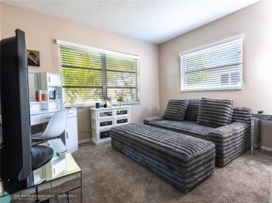 Discover the charm of this inviting single-family home. Located on Crystal Lake Country Club in Florida - for sale on GolfHomes.com, golf home, golf lot