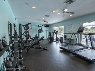 Discover the charm of this inviting single-family home. Located on Crystal Lake Country Club in Florida - for sale on GolfHomes.com, golf home, golf lot