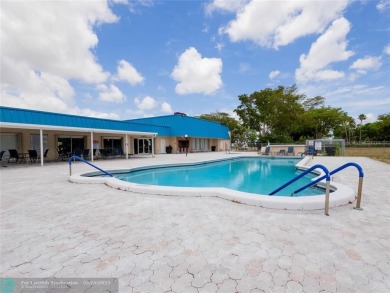 Discover the charm of this inviting single-family home. Located on Crystal Lake Country Club in Florida - for sale on GolfHomes.com, golf home, golf lot