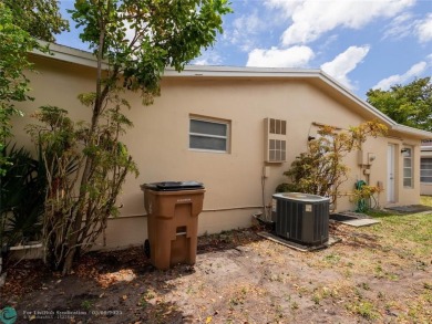 Discover the charm of this inviting single-family home. Located on Crystal Lake Country Club in Florida - for sale on GolfHomes.com, golf home, golf lot