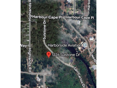 Build your dream home in Harbour Heights, a quiet Punta Gorda on Deep Creek Golf Club in Florida - for sale on GolfHomes.com, golf home, golf lot