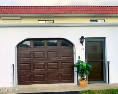 Nestled between a conservation area and the intracoastal on Ocean Palm Golf Course in Florida - for sale on GolfHomes.com, golf home, golf lot