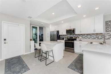 Experience the pinnacle of resort-style living in this on Heritage Landing Golf  in Florida - for sale on GolfHomes.com, golf home, golf lot