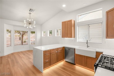 This beautifully updated Sun City Summerlin home has an open on Highland Falls Golf Club in Nevada - for sale on GolfHomes.com, golf home, golf lot