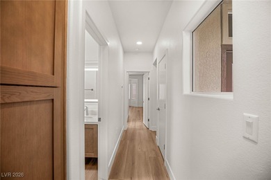 This beautifully updated Sun City Summerlin home has an open on Highland Falls Golf Club in Nevada - for sale on GolfHomes.com, golf home, golf lot