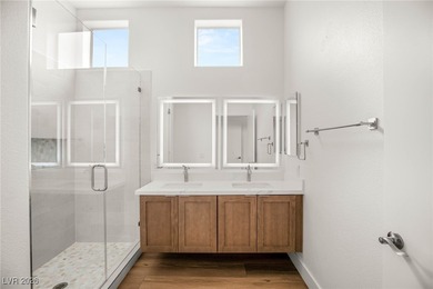 This beautifully updated Sun City Summerlin home has an open on Highland Falls Golf Club in Nevada - for sale on GolfHomes.com, golf home, golf lot