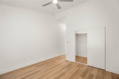 This beautifully updated Sun City Summerlin home has an open on Highland Falls Golf Club in Nevada - for sale on GolfHomes.com, golf home, golf lot