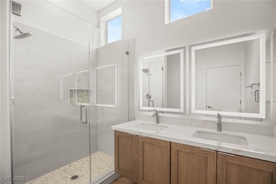 This beautifully updated Sun City Summerlin home has an open on Highland Falls Golf Club in Nevada - for sale on GolfHomes.com, golf home, golf lot