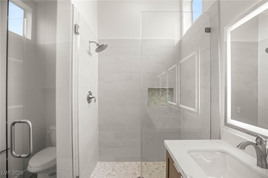 This beautifully updated Sun City Summerlin home has an open on Highland Falls Golf Club in Nevada - for sale on GolfHomes.com, golf home, golf lot