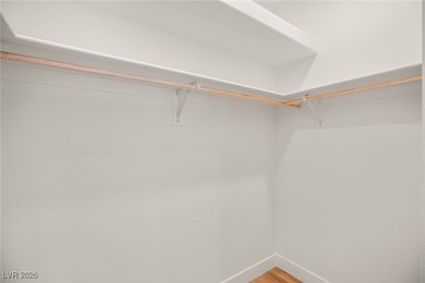 This beautifully updated Sun City Summerlin home has an open on Highland Falls Golf Club in Nevada - for sale on GolfHomes.com, golf home, golf lot