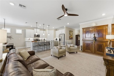 WATER & GOLF VIEWS highlight this beautifully maintained on Herons Glen Golf and Country Club in Florida - for sale on GolfHomes.com, golf home, golf lot