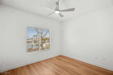 This beautifully updated Sun City Summerlin home has an open on Highland Falls Golf Club in Nevada - for sale on GolfHomes.com, golf home, golf lot