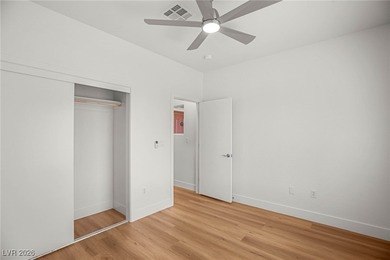 This beautifully updated Sun City Summerlin home has an open on Highland Falls Golf Club in Nevada - for sale on GolfHomes.com, golf home, golf lot