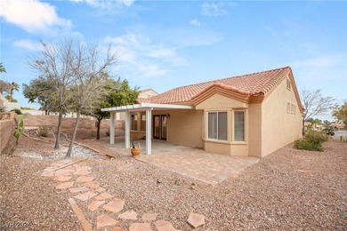 This beautifully updated Sun City Summerlin home has an open on Highland Falls Golf Club in Nevada - for sale on GolfHomes.com, golf home, golf lot