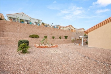 This beautifully updated Sun City Summerlin home has an open on Highland Falls Golf Club in Nevada - for sale on GolfHomes.com, golf home, golf lot