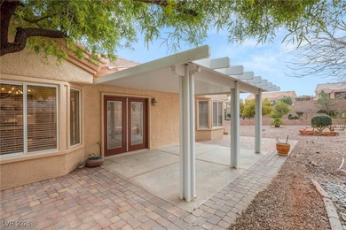 This beautifully updated Sun City Summerlin home has an open on Highland Falls Golf Club in Nevada - for sale on GolfHomes.com, golf home, golf lot