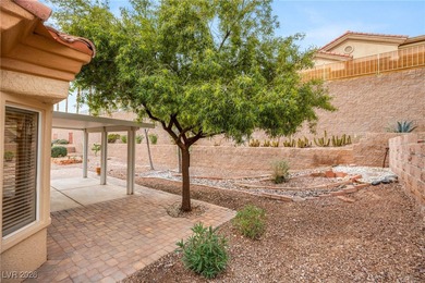 This beautifully updated Sun City Summerlin home has an open on Highland Falls Golf Club in Nevada - for sale on GolfHomes.com, golf home, golf lot