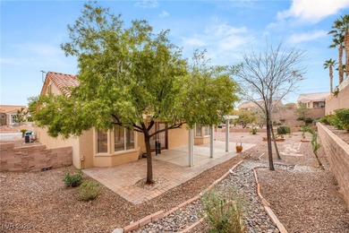 This beautifully updated Sun City Summerlin home has an open on Highland Falls Golf Club in Nevada - for sale on GolfHomes.com, golf home, golf lot
