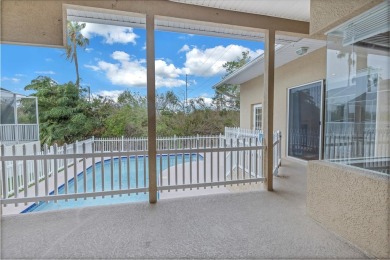 Move-in ready pool home in Long Bayou Estates! This on Seminole Lake Country Club in Florida - for sale on GolfHomes.com, golf home, golf lot